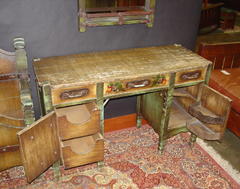 Dressing table shown open, revealing interior drawers and metal racks.